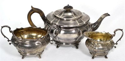 Lot 308 - A silver three piece tea service, Charles Stuart Harris, London, 1904