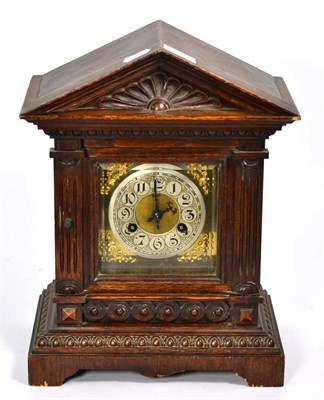 Lot 310 - An oak cased Junghans mantel clock