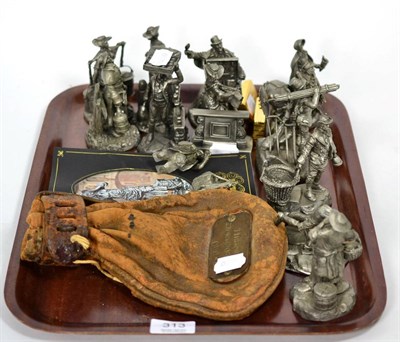 Lot 313 - A set of Franklin mint ";Cries of London"; pewter figures; British Rail leather cash bag and coins