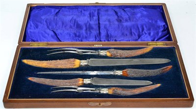 Lot 321 - A Victorian five piece carving set, in a fitted walnut case