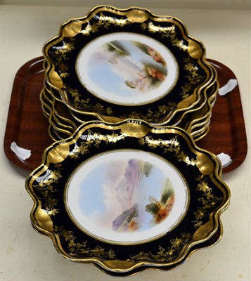 Lot 333 - A 19th century Aynsley's dessert service with painted scenes and blue and gilt borders...