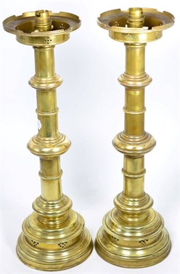 Lot 345 - A pair of large brass candlesticks converted to electric