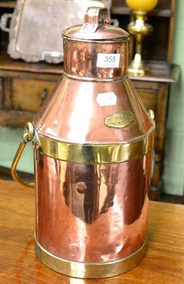 Lot 355 - A late Victorian copper and brass milk churn