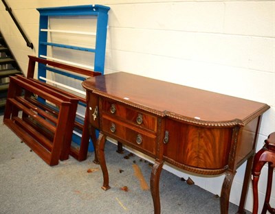 Lot 1037 - A painted Delft rack together with three modern hanging plate racks and a mahogany sideboard raised