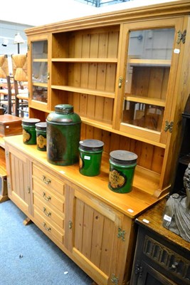 Lot 1049 - Beaverman: A Colin Almack pine dresser, the upper section with two glazed doors enclosing three...