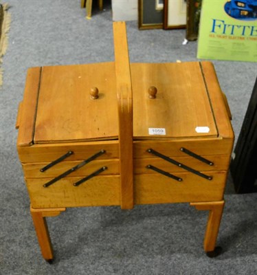 Lot 1059 - A mid 20th century hinged sewing box