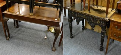 Lot 1075 - A carved three drawer table and a mahogany centre table on claw and ball feet (2)