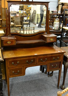 Lot 1076 - An Edwardian mahogany and satinwood banded dressing table, with two short over two long...