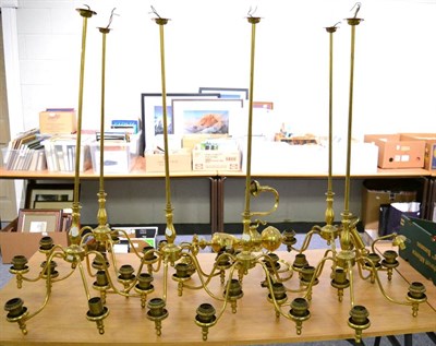 Lot 1095 - A group of six gilt metal ceiling light fittings together with two others and two boxes of shades