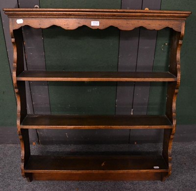 Lot 1112 - A hanging plate rack/shelf