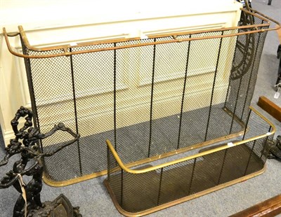 Lot 1114 - A large nursery fender with copper hanging rail together with a smaller example