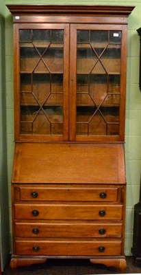 Lot 1194 - An early 20th century mahogany bureau bookcase