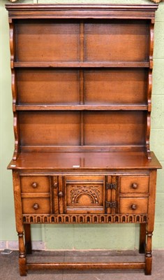 Lot 1199 - A small oak dresser and rack