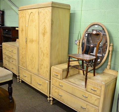 Lot 1202 - An early/mid 20th century bedroom suite comprising dressing table, chest of drawers, wardrobe...