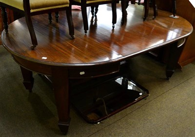 Lot 1224 - Early 20th century mahogany extending dining table with two leaves raised on square tapering legs