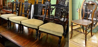 Lot 1225 - A set of four low salon chairs with carved pierced splat and a porcelain inset bedroom chair (5)