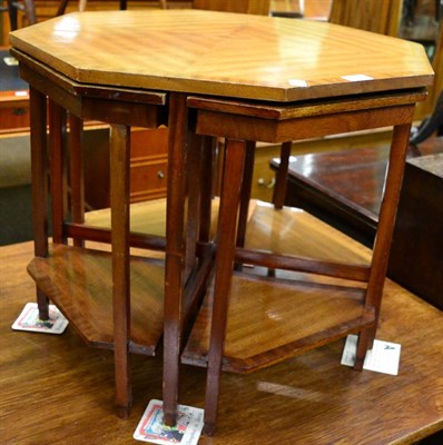 Lot 1228 - An octagonal nest of tables