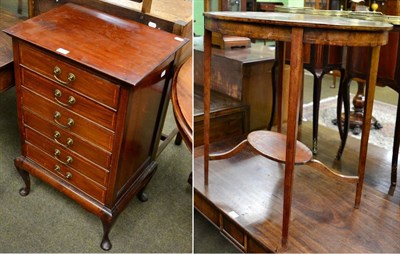 Lot 1230 - An Edwardian line inlaid mahogany music cabinet with ivorine label for Denby & Spinks, Leeds and an