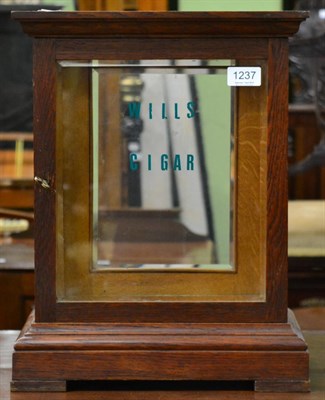 Lot 1237 - An oak glazed Wills cigar counter top display cabinet