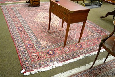 Lot 1268 - Tabriz design carpet the Herati field centred by an ivory medallion framed by spandrels and samovar