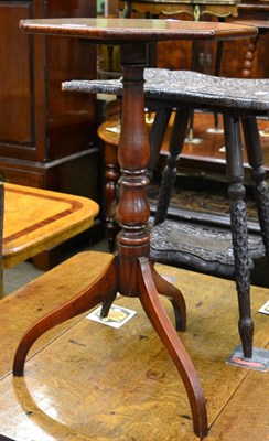 Lot 1282 - A 19th century mahogany tripod table