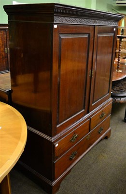 Lot 1288 - A mahogany linen press of small proportions