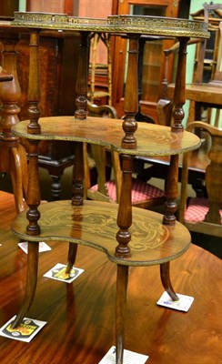 Lot 1292 - A late 19th century French marquetry three-tier etagere, pierced gilt gallery, turned supports,...