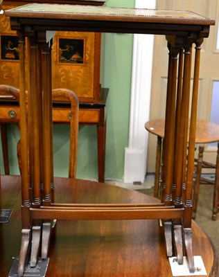 Lot 1302 - Three early 20th century mahogany nesting tables of rectangular graduated form, raised on...