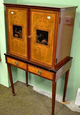 Lot 1305 - An Edwardian cabinet on stand, decorated with marquetry and lacquer panels in chinoiserie style...