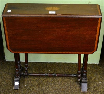 Lot 1313 - A small Edwardian cross banded Sutherland table