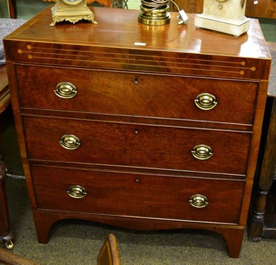 Lot 1317 - An early 19th century mahogany chest