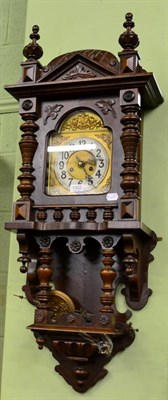 Lot 1322 - A mahogany wall clock