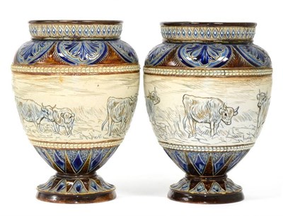 Lot 12 - Hannah Bolton Barlow (1851-1916) A Pair of Doulton Lambeth Stoneware Vases, incised with...