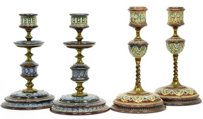 Lot 37 - A Pair of Doulton Lambeth Stoneware Candlesticks, with applied decoration and brass fitments,...