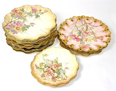 Lot 47 - A Doulton Burslem Plate, decorated with flowers, highlighted in gilt on a blush ground, fluted rim