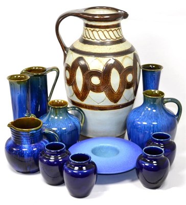 Lot 55 - Four Small Doulton Lambeth Vases, all shape number D 5827 with a blue glaze, each with...