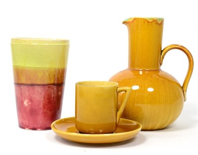 Lot 72 - A Linthorpe Pottery Cup and Saucer, mustard glaze, saucer impressed HT LINTHORPE Chr Dresser...