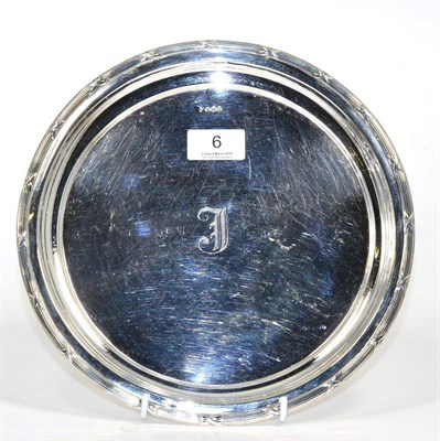 Lot 6 - A circular silver tray, Hammond, Creake & Co, Sheffield 1911, with reed and ribbon border,...