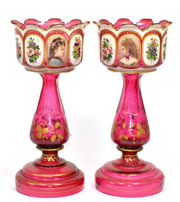 Lot 14 - A pair of 19th century cranberry table lustres, each of baluster stemmed form, painted with...