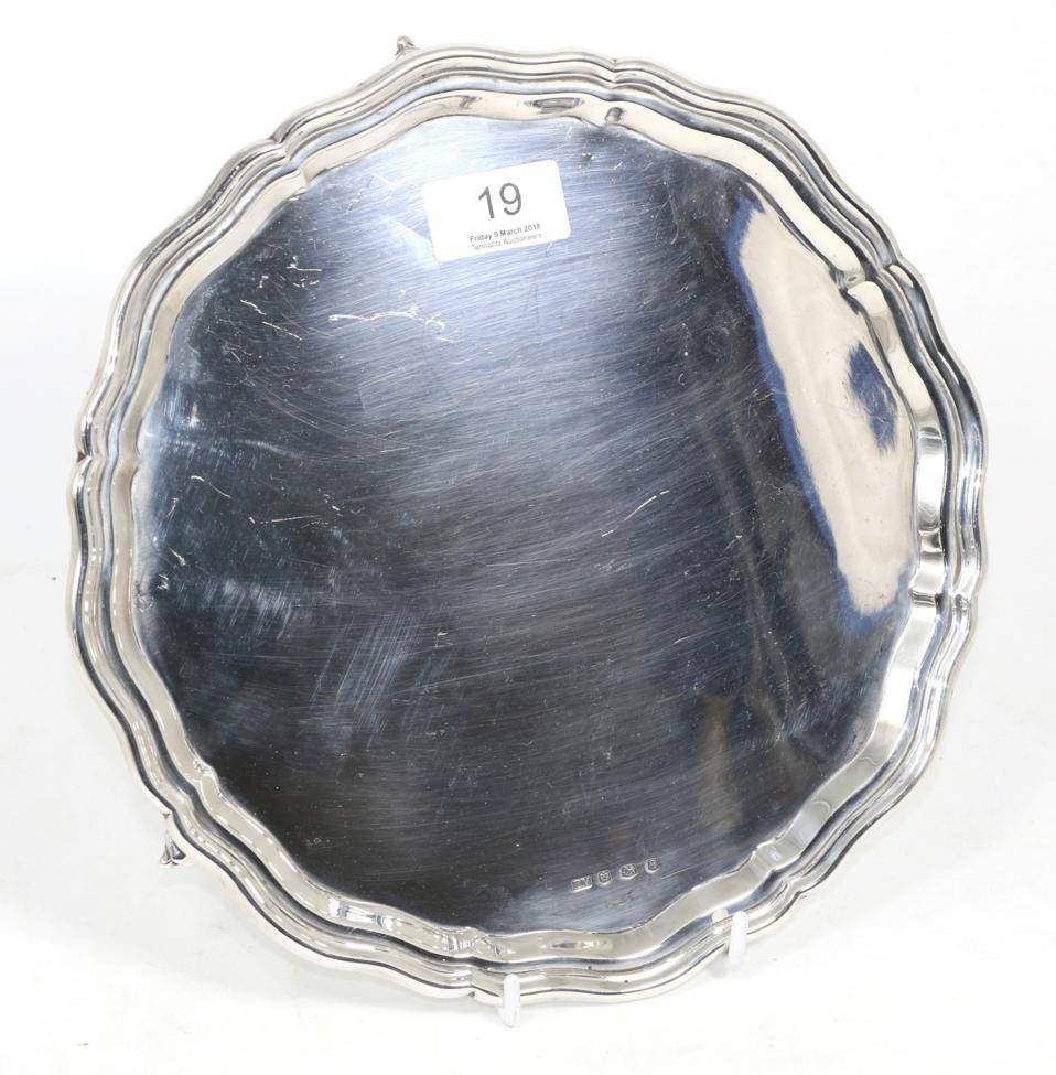 Lot 19 - A shaped circular silver salver, Viners, Sheffield 1933, 25cm diameter, 17.9ozt