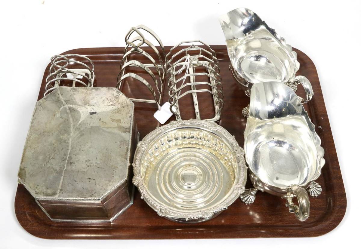Lot 29 - A pair of electroplated George III style sauce boats; a silver plated table box with cut corners; a