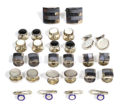 Lot 60 - A silver and cats eye dress set, comprising a pair of swivel bar cufflinks and four dress...
