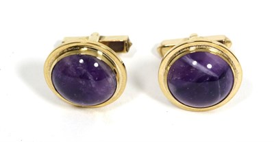 Lot 62 - A pair of 9 carat gold amethyst cufflinks, round cabochon amethyst in rubbed over settings, to...
