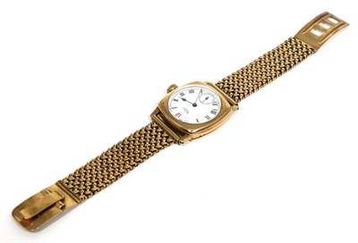 Lot 65 - A 9 carat gold cushion shaped wristwatch signed Waltham, USA, with attached 9 carat gold bracelet