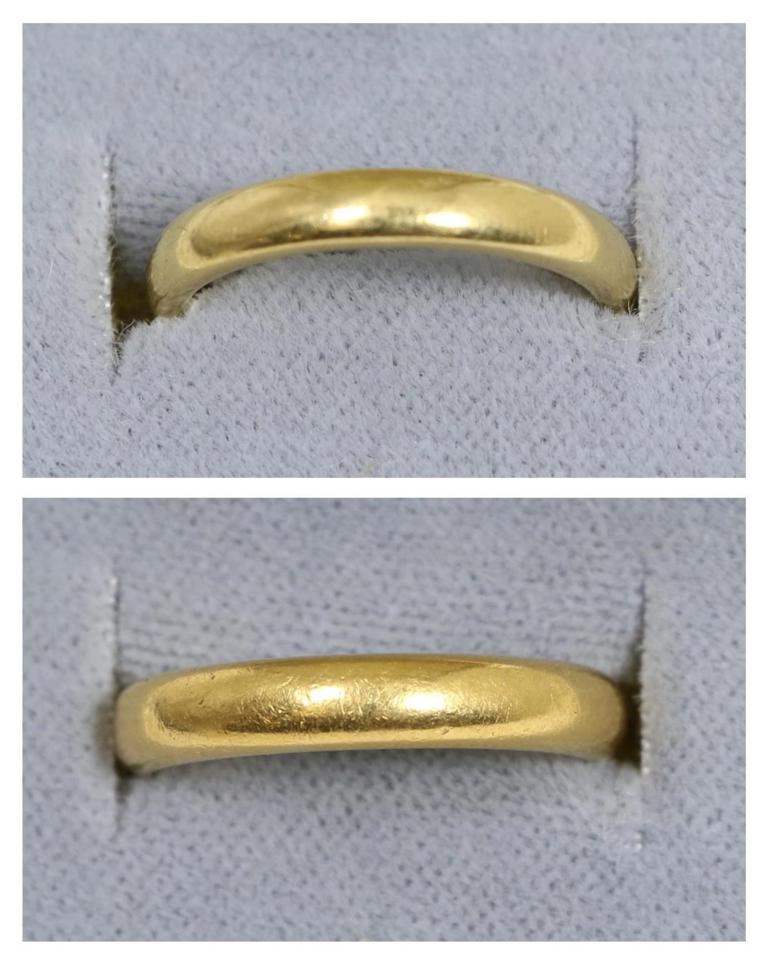 Lot 72 - A 22 carat gold band ring, finger size K and an 18 carat gold band ring, finger size H1/2 (2)