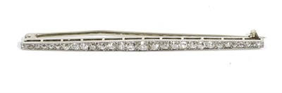 Lot 83 - A diamond bar brooch, a tapered bar set with graduated old cut diamonds in milgrain settings, total