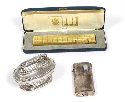 Lot 107 - A Dunhill Rollagas lighter (cased), together with a Ronson table lighter and a Ronson pocket...