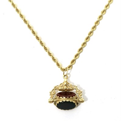 Lot 114 - A 9 carat gold hardstone swivel fob on a 9 carat gold rope chain necklace, oval bloodstone,...