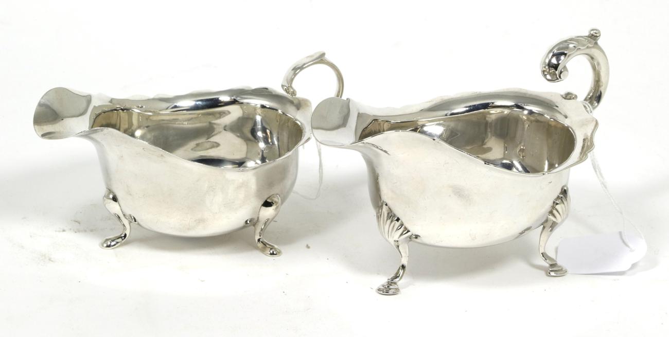 Lot 116 - A George III style silver sauceboat, Jay, Richard Attenborough Co, Sheffield 1913; together...