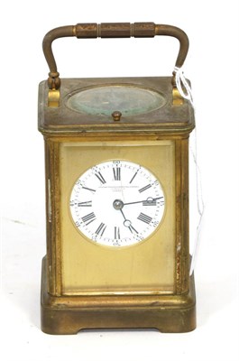 Lot 120 - A brass striking and repeating carriage clock, retailed by Goldsmiths & Silversmiths Company...